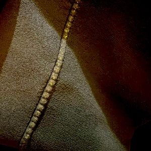 Beautiful black shirt with glass beads at wrist and waistline